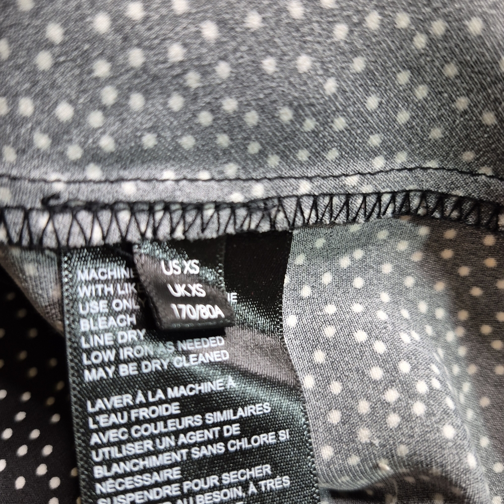 Chic Black and White Spotted Midi Dress - Picture 4 of 7